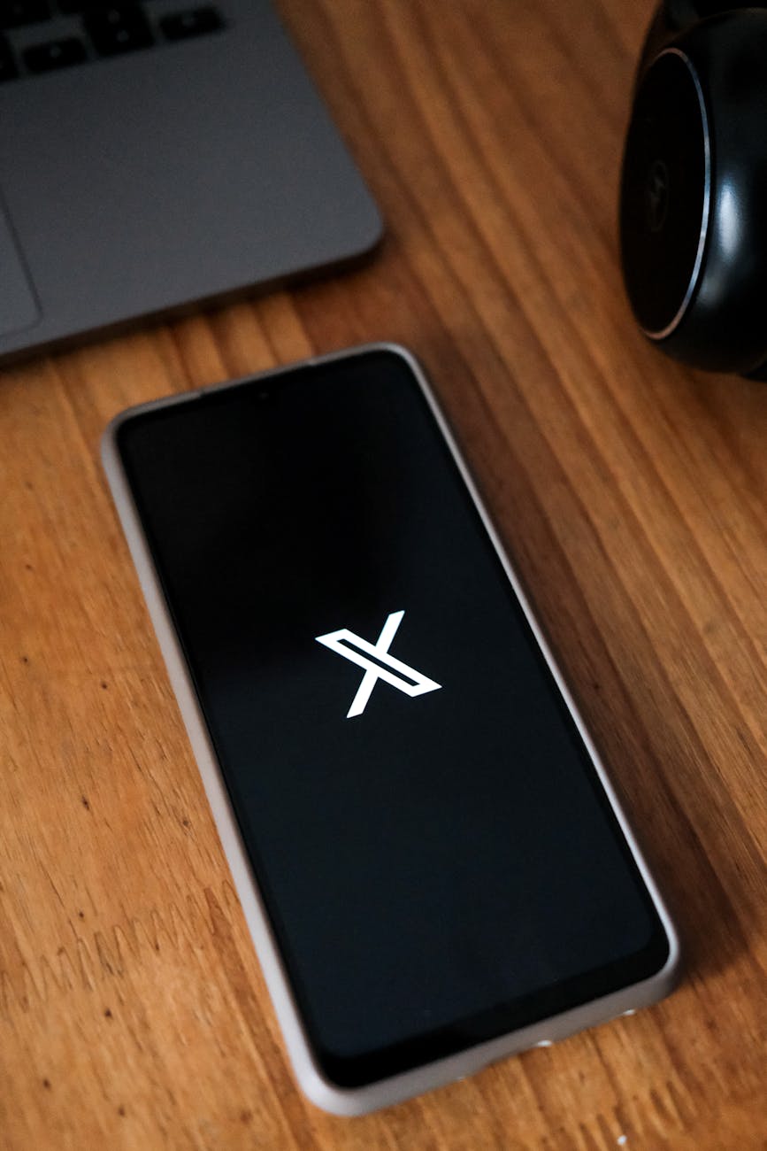 social media smartphone with social media icon on desk