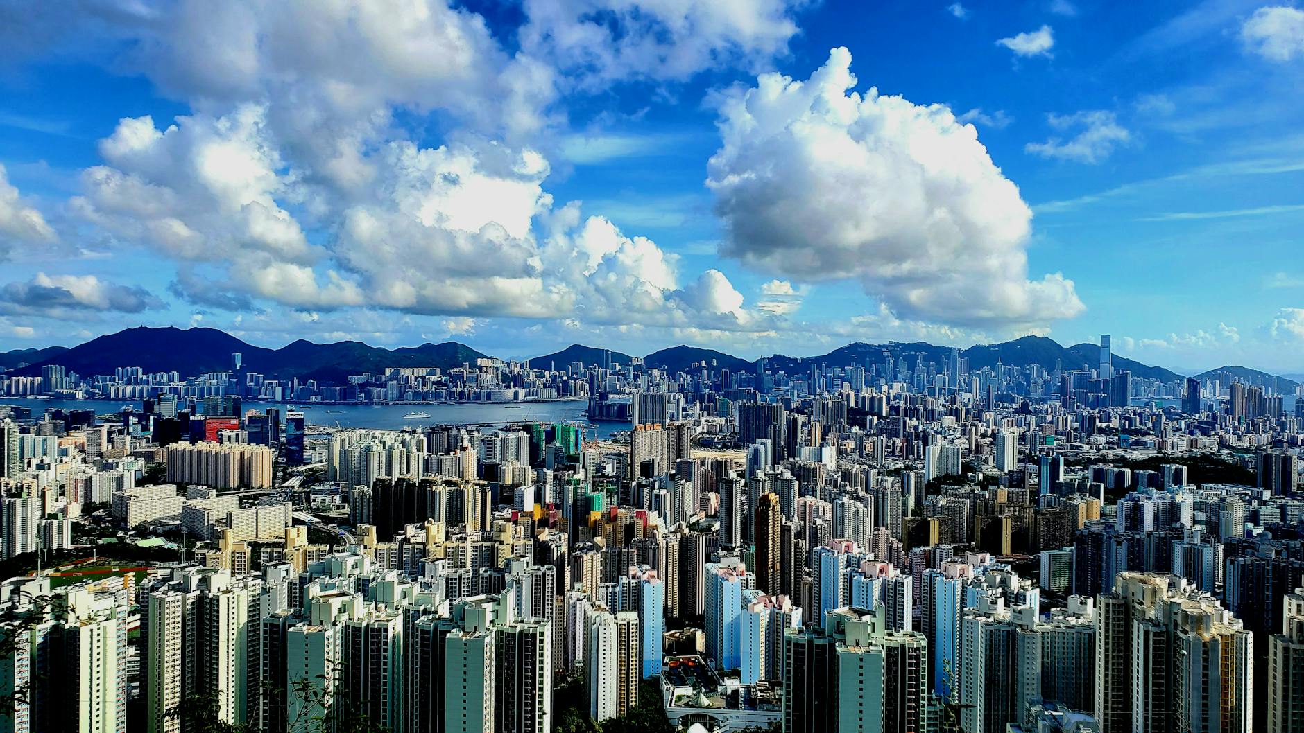 modern city against a cloudy sky