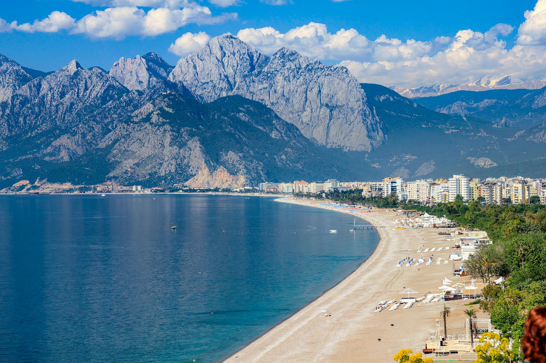 mountains behind beach in antalya in turkey